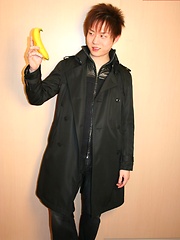 Cute Korean boy playing with his banana