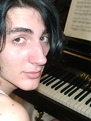 Leo - long dark haired smooth twink