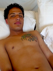 Latino twink strokes his cock