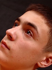 Cute teen boy shows uncut cock