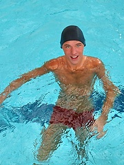 Slim teen boy swimming pool fun