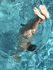 Keith sweeming in a pool and jacking off dick after