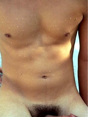 Sexy twink plays with dildo pool side.