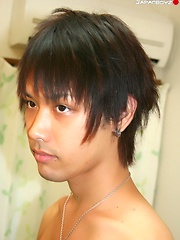 Hot and hung Japanese stud Naoto exercising his cock