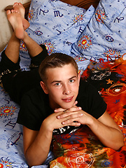 Cute twink shows his uncut cock
