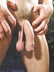 Thomas eats a peach while his uncut cock hangs out.