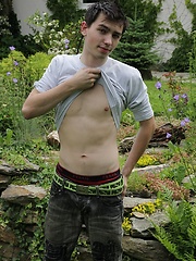 Patrick Bones masturbating his hard cock outdoors.