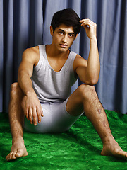 Good-looking twink posing at the studio