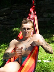 Dom Ully strips and masturbates out in the backyard.