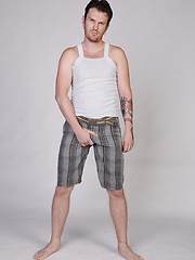 Lonely gay dude Luke Cross strips and shows his tattooed body and hard dick